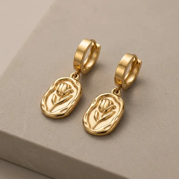 Golden_Floral_Hoop_Earrings_With_Embossed_Design