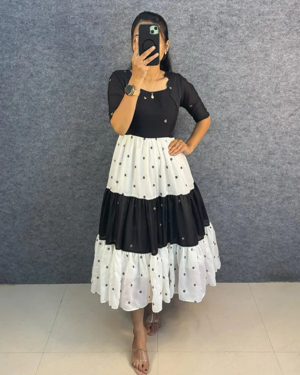JISAL_THREE_FLARE_GOWN