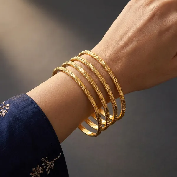 Gold_Plated_Textured_Embossed_Bangles_For_Women_(Pack_of_4_)