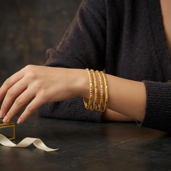 Gold_Plated_Textured_Embossed_Bangles_For_Women_(Pack_of_4_)