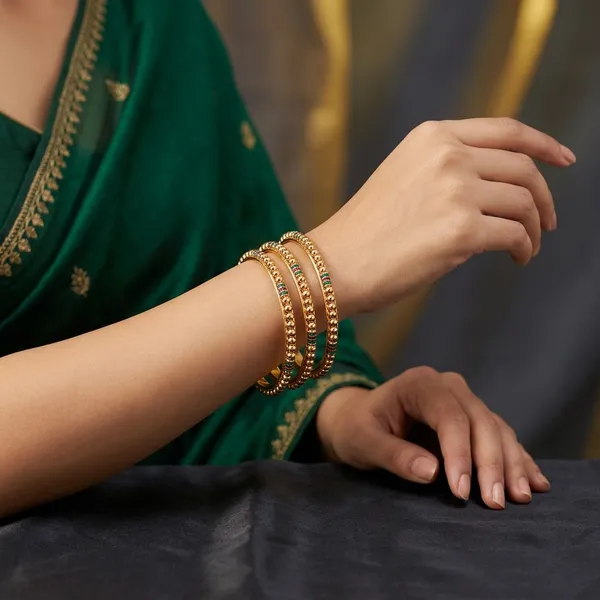 Gold_Stone_Studded_Bangles_For_Women_(Pack_of_4_)