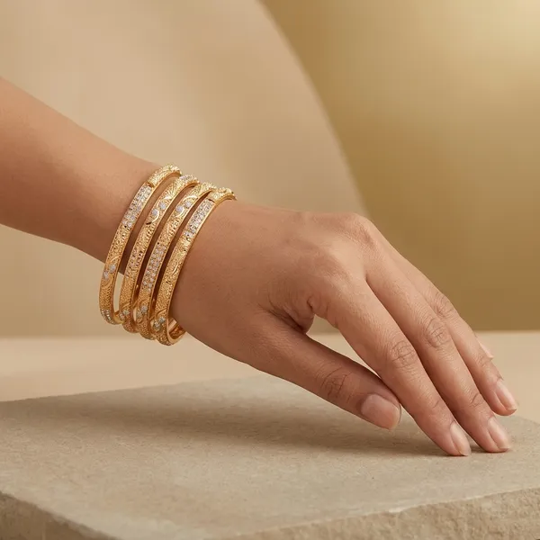 Pink_Gold_Plated_Alloy_Textured_Bangles_For_Women_(Pack_of_4_)