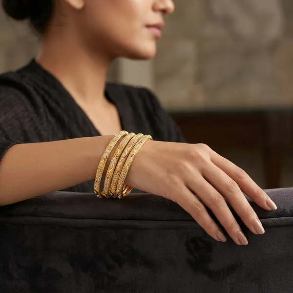 Pink_Gold_Plated_Alloy_Textured_Bangles_For_Women_(Pack_of_4_)