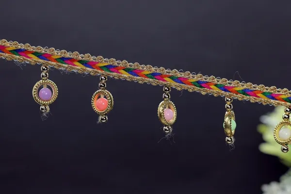 Multicolor_Braided_Trim_With_Gold_Beads_And_Charms
