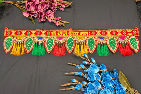Shree_Ganeshaya_Namah_Traditional_Red_Toran_with_Green_Leaf_Design_&_Colorful_Tassels_{_37_INCH_}