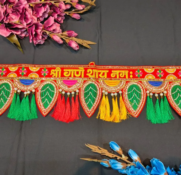 Shree_Ganeshaya_Namah_Traditional_Red_Toran_with_Green_Leaf_Design_&_Colorful_Tassels_{_37_INCH_}