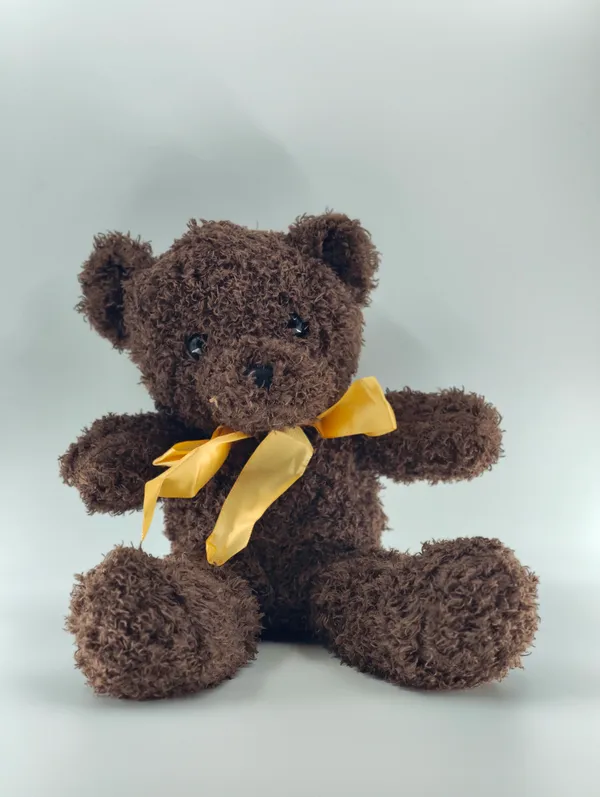Soft_Brown_Teddy_Bear_With_Yellow_Ribbon