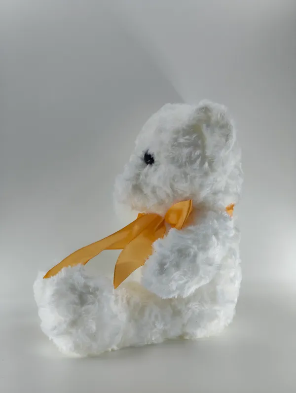 Fluffy_White_Plush_Teddy_With_Orange__Ribbon