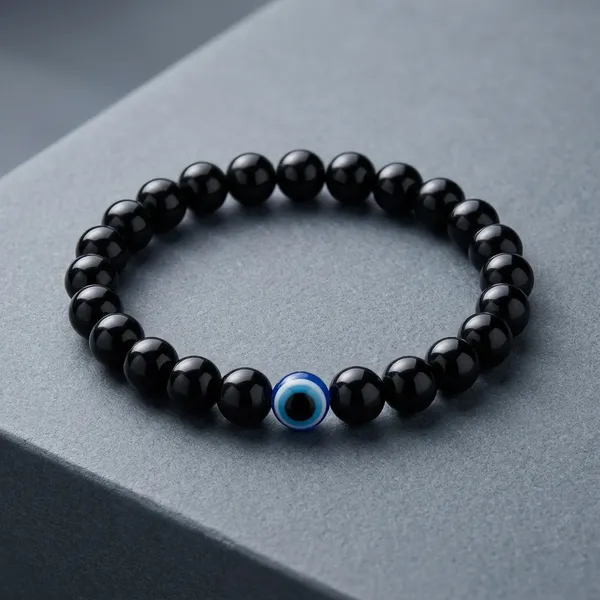 Black_Beaded_Bracelet_with_Blue_Evil_Eye_Charm