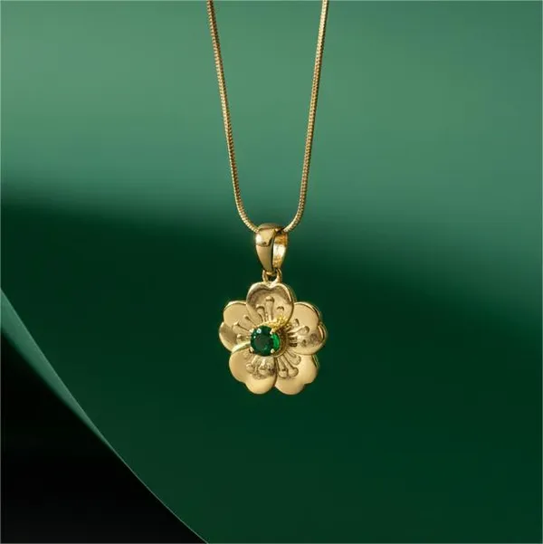 Gold_Floral_Pendant_Necklace_With_Cubic_Emerald_Stone