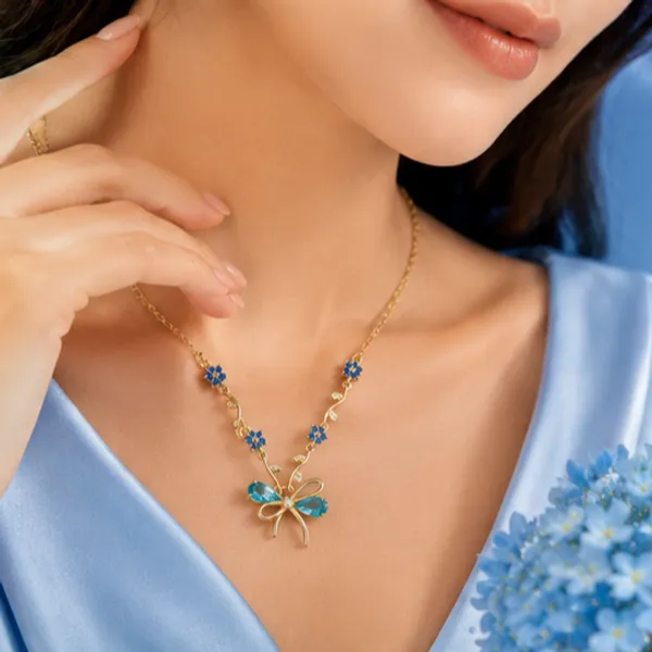 Ocean_Blossom_Tulip_&_Bow_Pendant_Necklace_–_18K_Gold_Plated_Botanical_Luxury