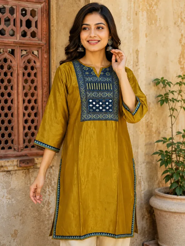 Mashroo_Silk_kurti_with_elegant_&_charming_work_done_on_neck_&_sleeves