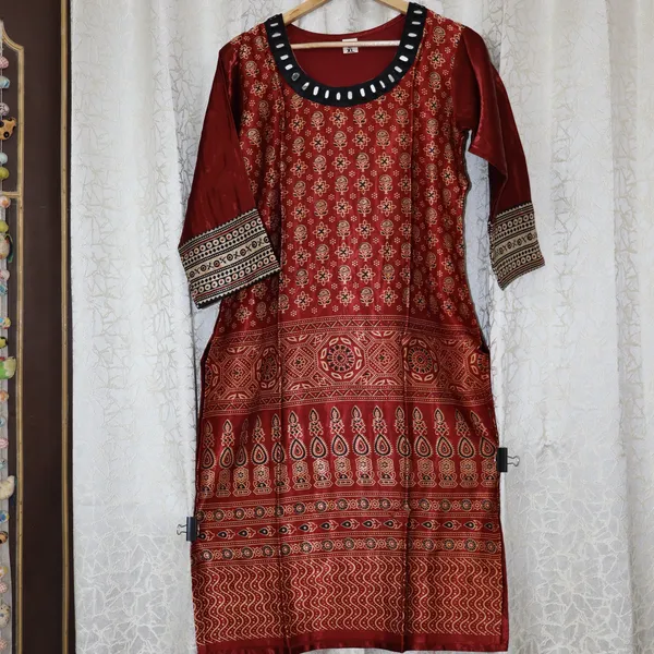 Mashroo_Silk_kurti_with_elegant_&_charming_work_done_on_neck_&_sleeves_&_bottom