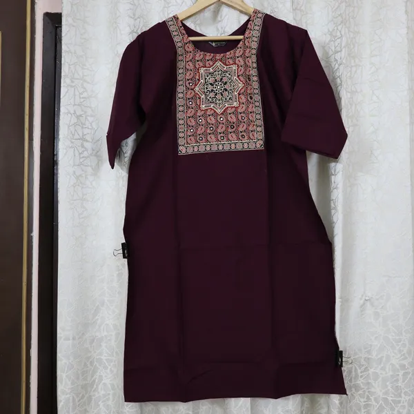Pure_cotton_kurti_with_unique_embroidery_on_neck_with_mirror_work