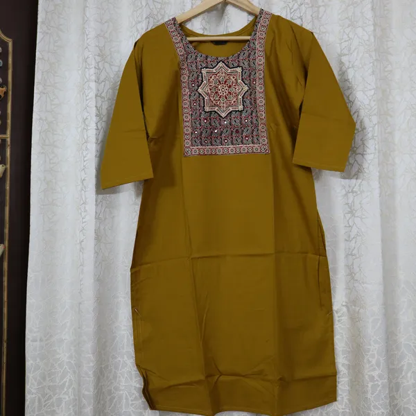 Pure_cotton_kurti_with_unique_embroidery_on_neck_with_mirror_work