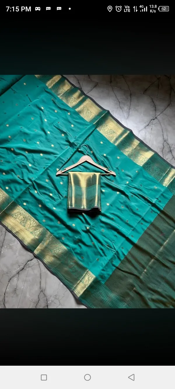 Turquoise_Silk_Zari_Butta_Saree_With_Golden_Border_For_Women