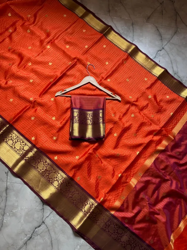 Orange_Kanjivaram_Silk_Zari_Butta_Saree_With_Maroon_Pallu_For_Women