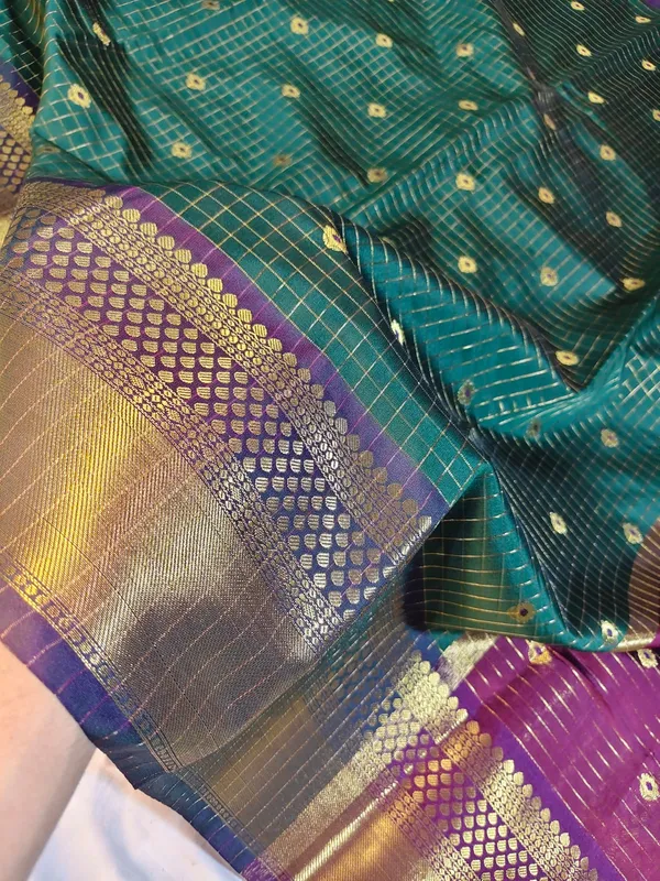 Teal_Green_Silk_Handloom_Floral_Zari_Border_Saree_For_Women
