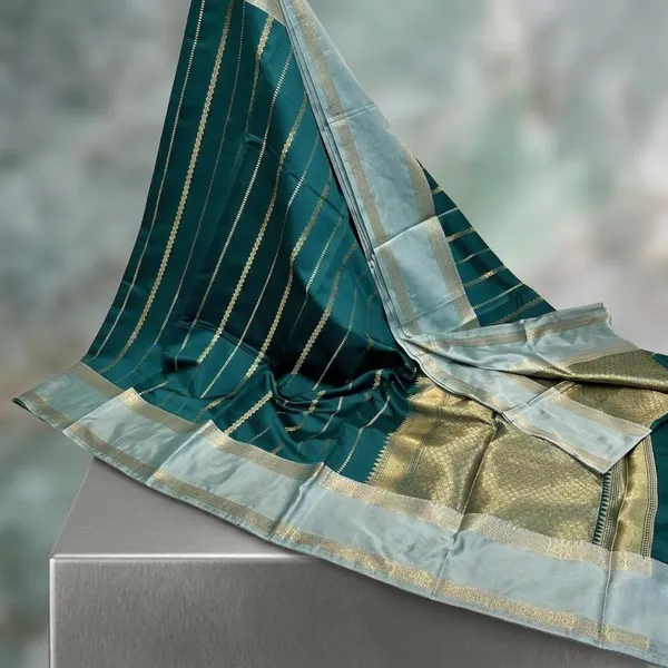 Teal_Green_Silk_Zari_Striped_Saree_With_Golden_Border_For_Women