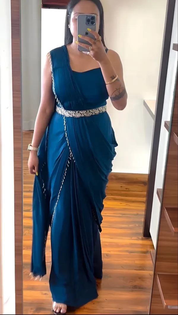 Elegant_Teal_Blue_Pre-Draped_Saree_With_Embellished_Blouse
