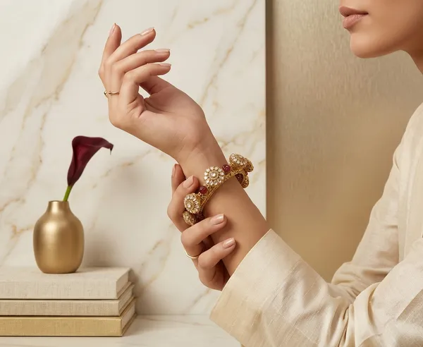 Gold_Tone_Embellished_Floral_Dome_Bracelet_With_Ruby_Accents
