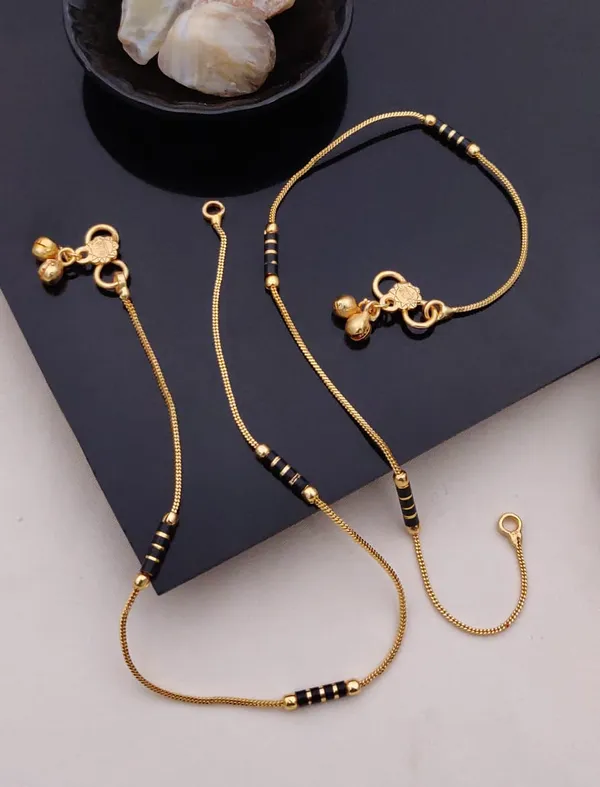Gold_Plated_Black_Beaded_Chain_Anklet_Pair_With_Decorative_Charms.