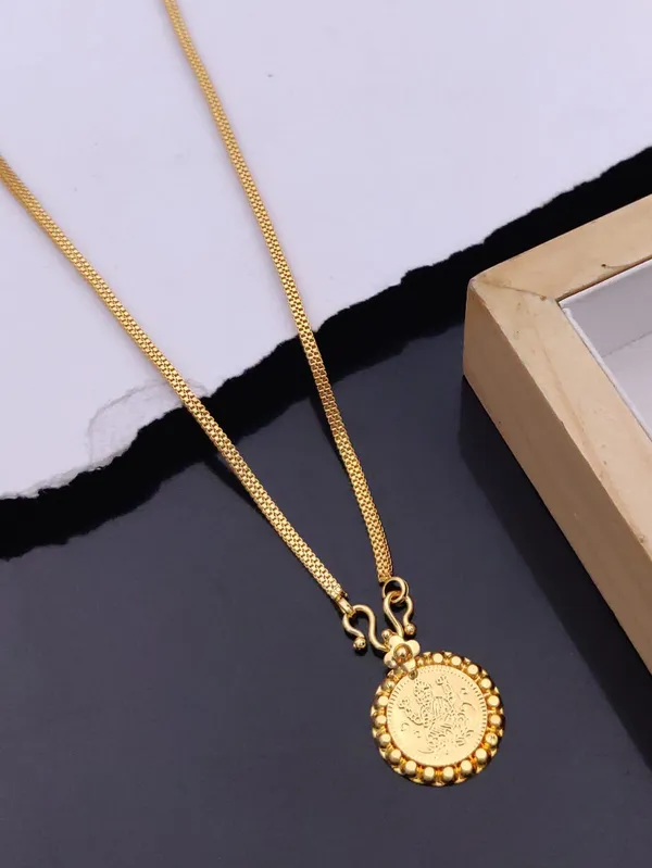 Traditional_Gold_Toned_Pendant_Chain_Necklace_With_Decorative_Coin