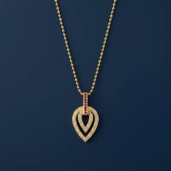 Elegant_Double_Heart_Gold_Pendant_Necklace_With_Red_Gemstones.