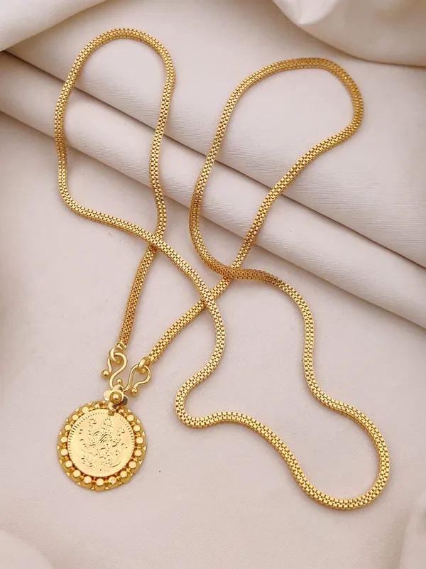 Traditional_Gold_Toned_Pendant_Chain_Necklace_With_Decorative_Coin