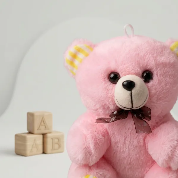 Pink_Teddy_Bear_Plush_Toy_With_Yellow_Striped_Ears