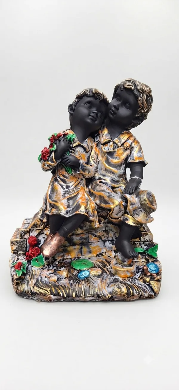 Multicolor_Boy_And_Girl_Sitting_Garden_Figurine