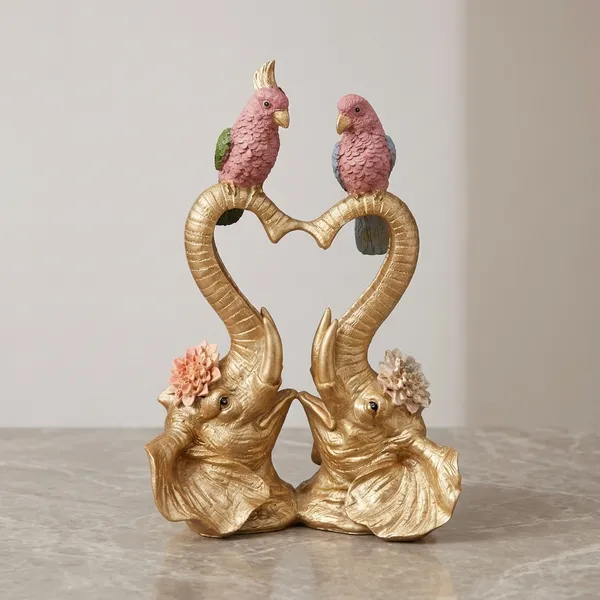Golden_And_Pink_Heart_Shaped_Elephant_Pair_With_Parrots_Figurine