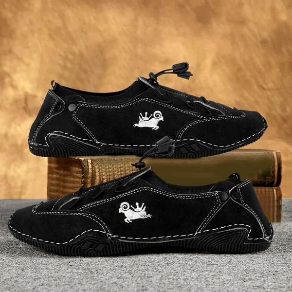 Black_Casual_Slip-On_Shoes_With_White_Stitching_And_Leaf_Logo_For_Men