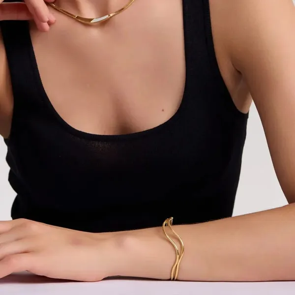 Gold-Toned_Wave_Design_Cuff_Bracelet_for_Women