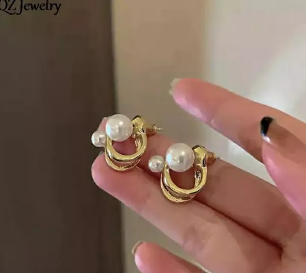 Gold-Tone_Pearl_Double_Stud_Earrings_with_Curved_Connector