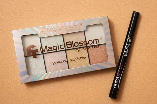 Duebold_-_Eyeshadow_Highlighter_Palette_With_8_Different_Colour_Shades_By_Ft_Magic_Blossom_And_Duebold_-_Eyeliner_By_Huda_Beauty_Pack_Of_2