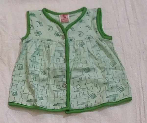 Green_Cotton_Printed_Sleeveless_Jhabla_Top_For_Babies