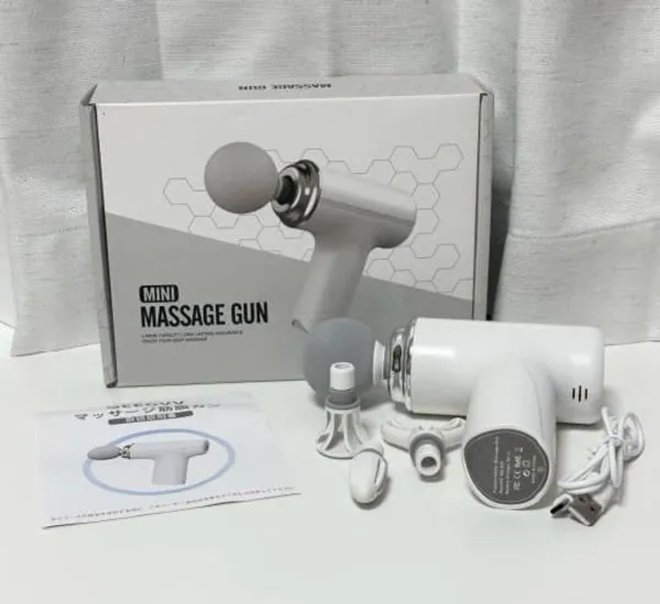 Mini_Massage_Gun_-_Portable_Deep_Tissue_Percussion_Massager_With_Multiple_Attachments