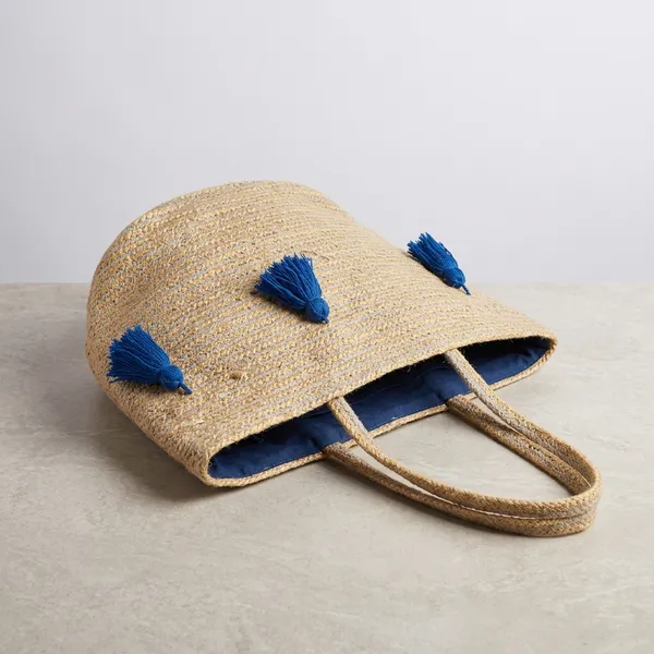 Coastal_Charm_Handmade_Tote_With_Blue_Pom_Pom_Accents