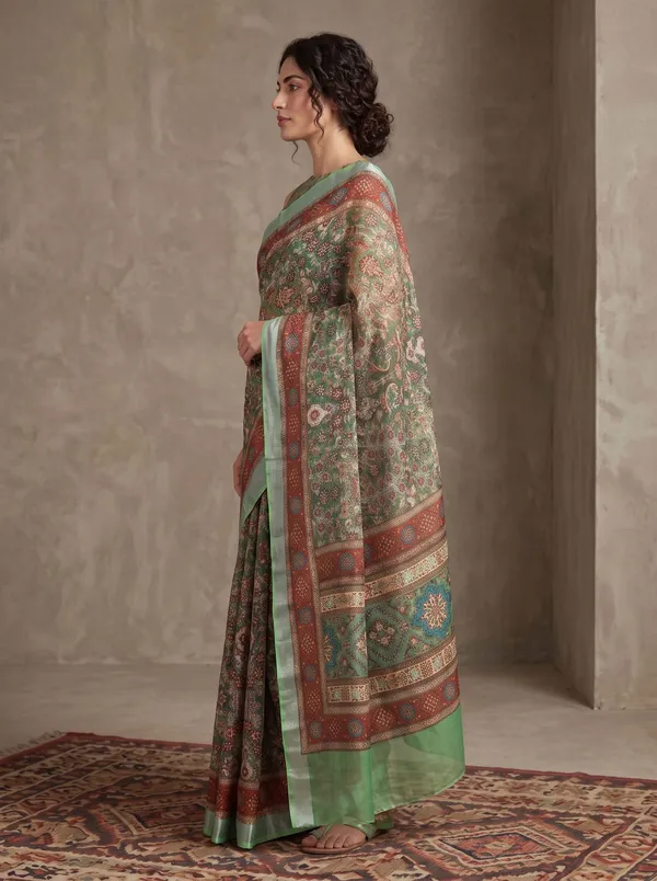 Green_Digital_Print_Art_Silk_Saree_with_Silver_Zari_Border_&_Floral_Motifs