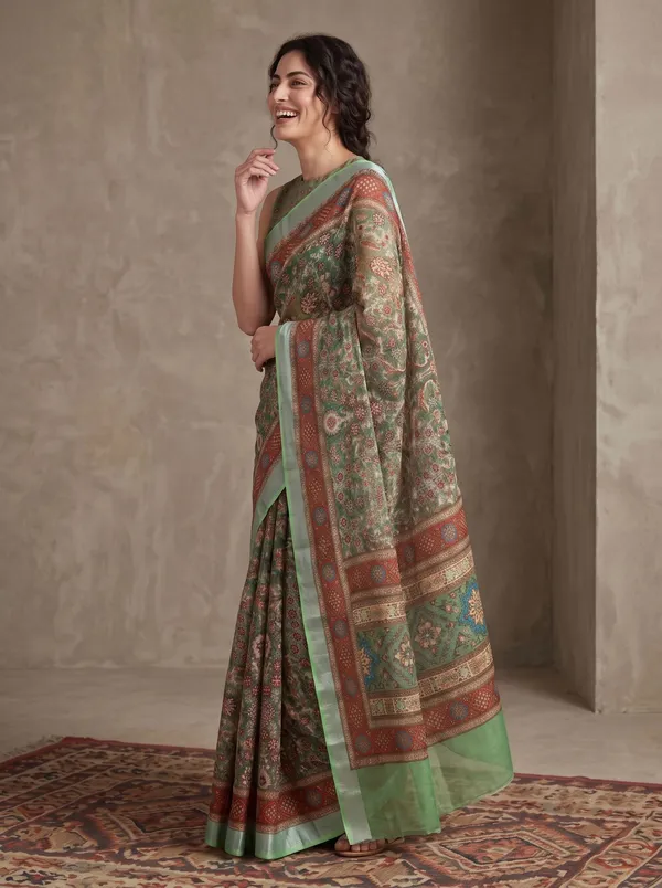Green_Digital_Print_Art_Silk_Saree_with_Silver_Zari_Border_&_Floral_Motifs