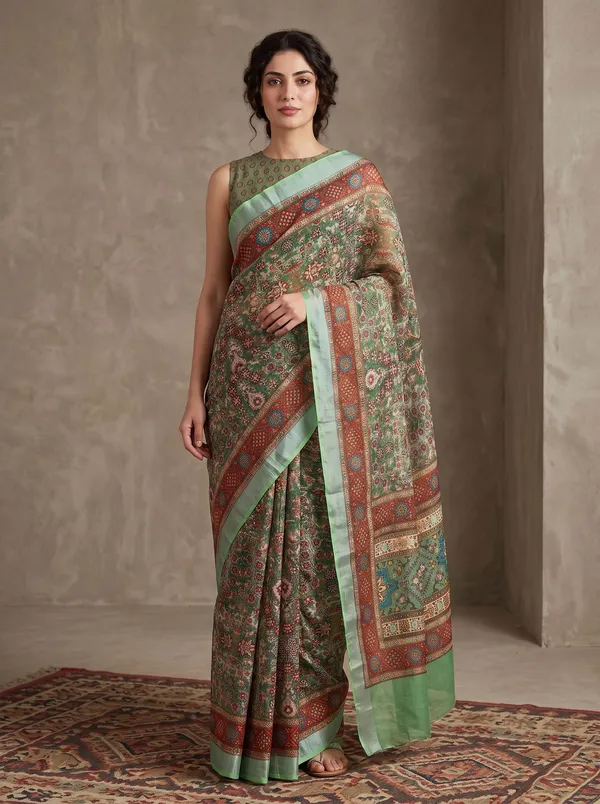 Green_Digital_Print_Art_Silk_Saree_with_Silver_Zari_Border_&_Floral_Motifs