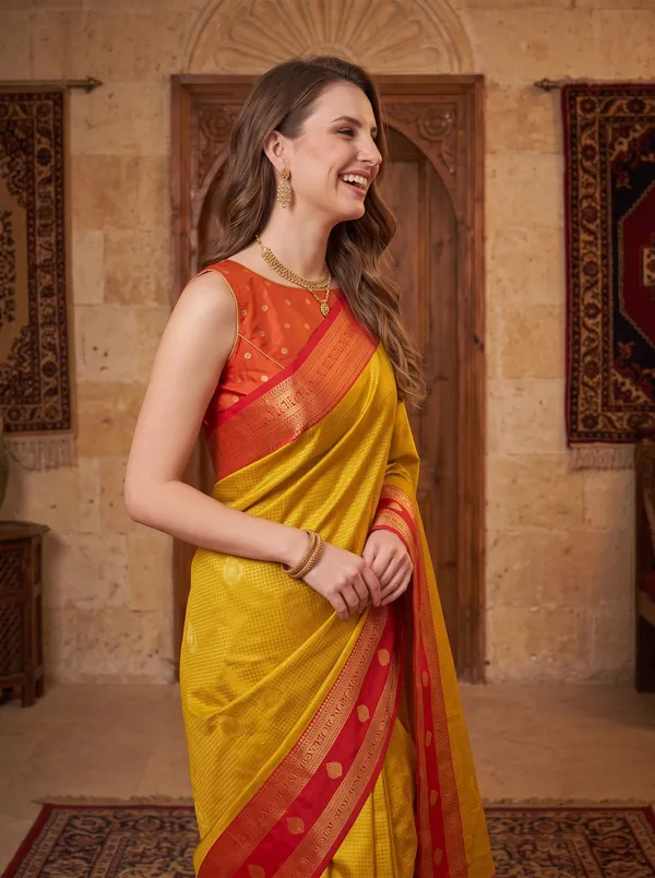 Yellow_Banarasi_Silk_Jacquard_Saree_with_Red_Border_&_Blouse