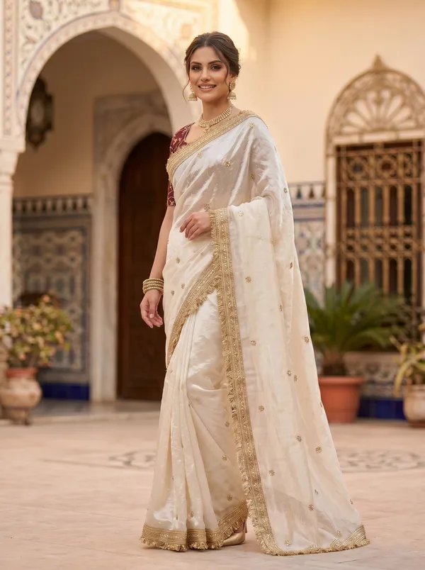 Off_White_Tissue_Satin_Silk_Saree_with_Zari,_Sequence_&_Fringe_Lace
