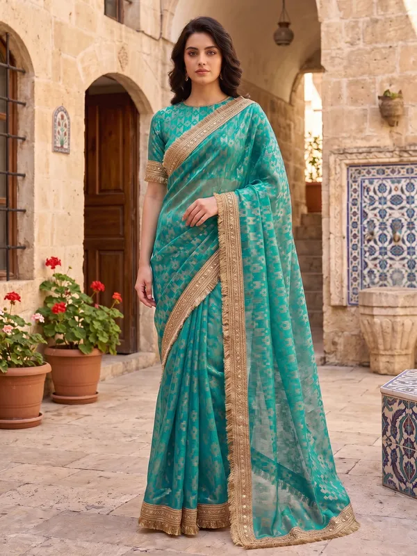 Teal_Jacquard_Satin_Tissue_Silk_Kiran_Border_Saree