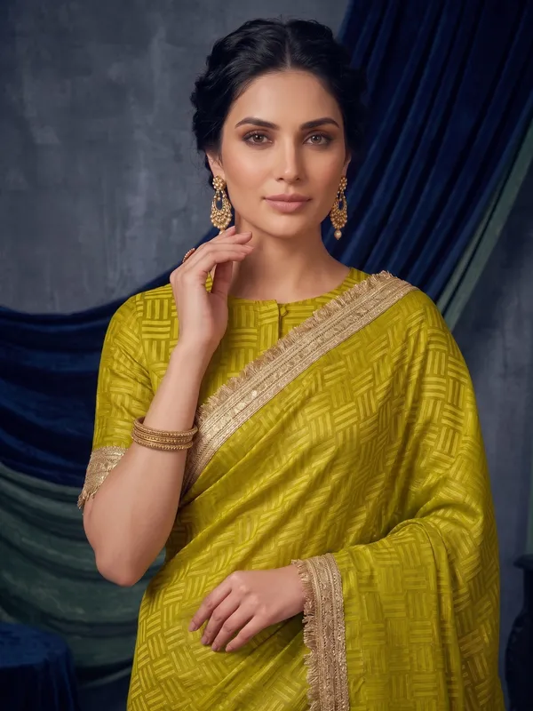 Mustard_Jacquard_Satin_Tissue_Silk_Saree_with_Kiran_Fringed_Border