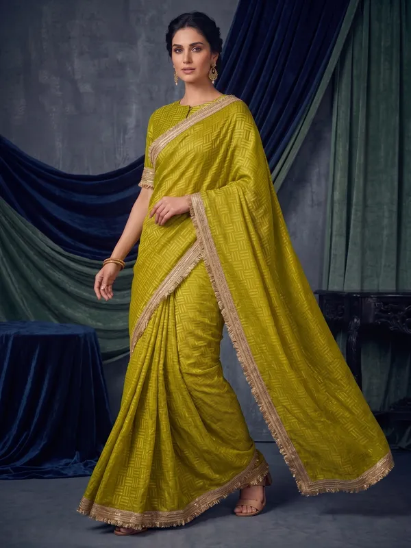 Mustard_Jacquard_Satin_Tissue_Silk_Saree_with_Kiran_Fringed_Border