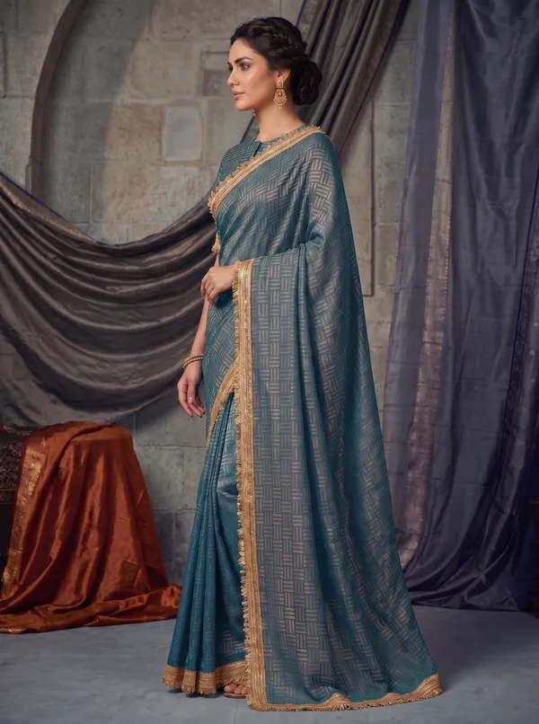 Teal_Jacquard_Satin_Tissue_Silk_Saree_with_Gold_Kiran_Fringed_Border