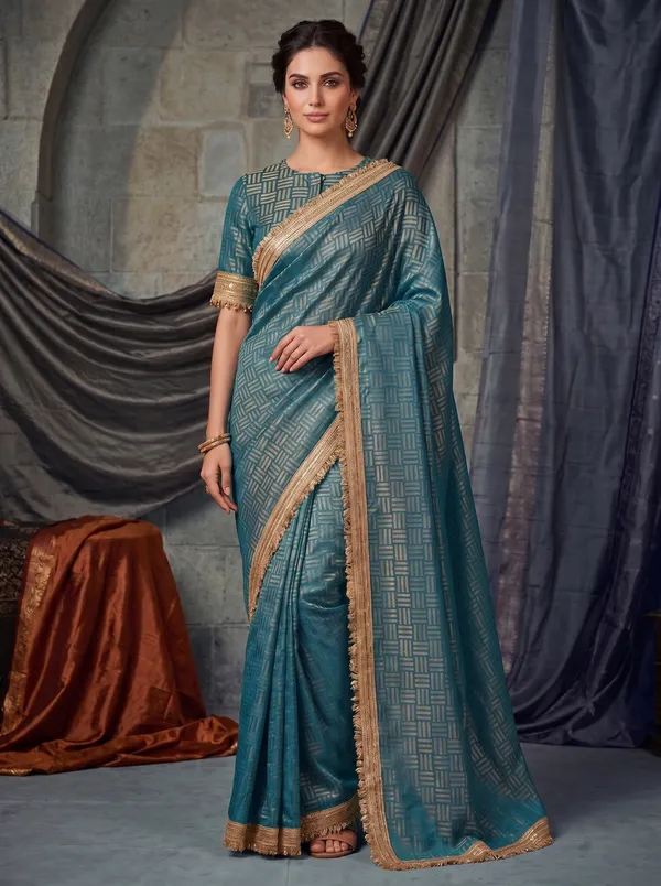Teal_Jacquard_Satin_Tissue_Silk_Saree_with_Gold_Kiran_Fringed_Border