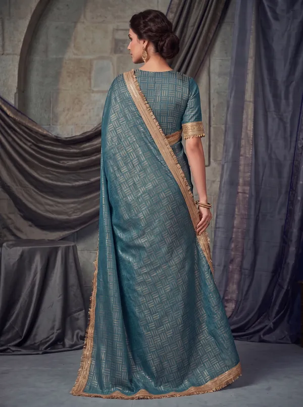 Teal_Jacquard_Satin_Tissue_Silk_Saree_with_Gold_Kiran_Fringed_Border